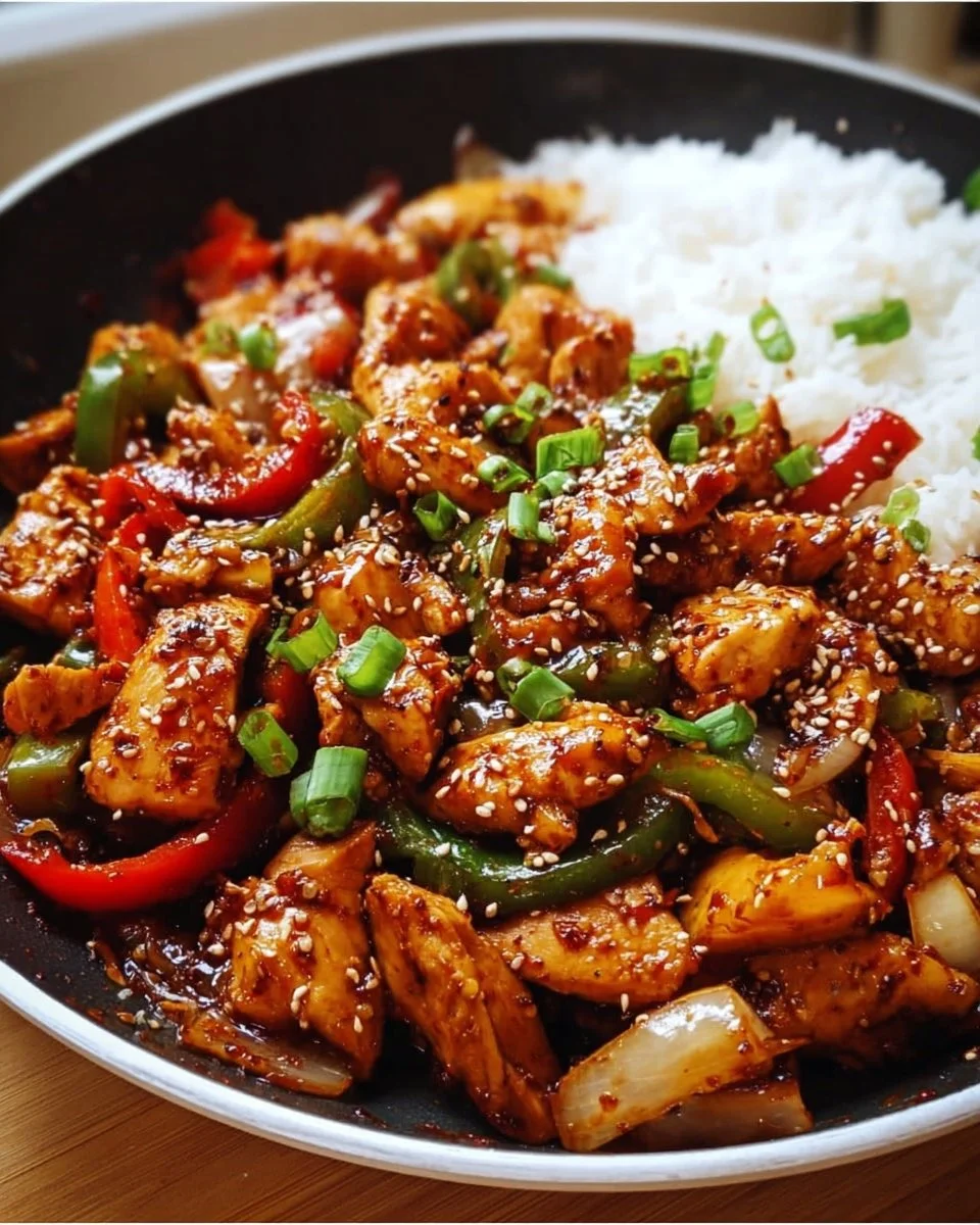 Delicious Korean spicy chicken stir fry with vibrant veggies and rich spices